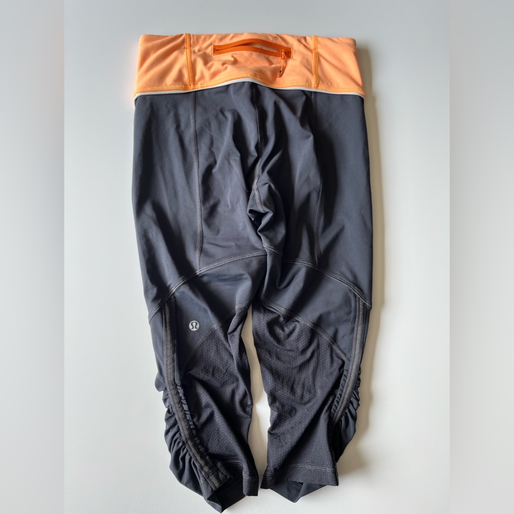 Lululemon Sz 4 Yoga Running Crop Legging Pant Capri black orange Waist